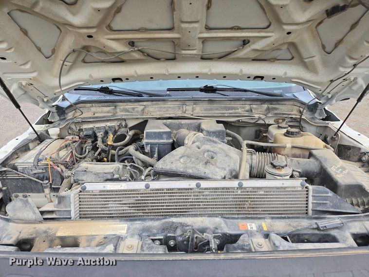 image for item ED2075 2011 Ford F350 Super Duty Crew Cab flatbed pickup truck