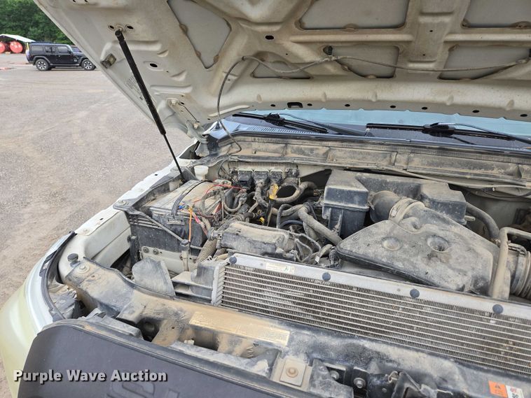 image for item ED2075 2011 Ford F350 Super Duty Crew Cab flatbed pickup truck