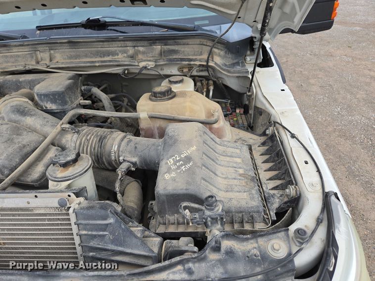 image for item ED2075 2011 Ford F350 Super Duty Crew Cab flatbed pickup truck