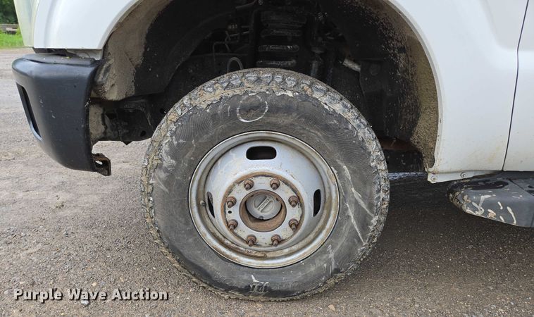 image for item ED2075 2011 Ford F350 Super Duty Crew Cab flatbed pickup truck