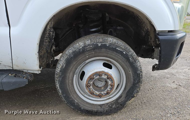 image for item ED2075 2011 Ford F350 Super Duty Crew Cab flatbed pickup truck