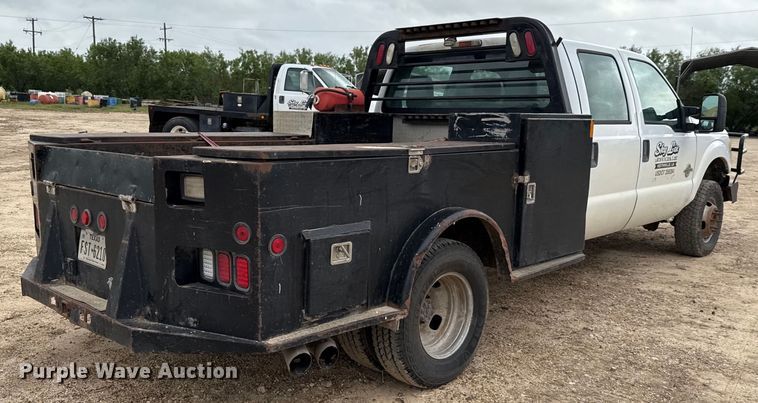 image for item ED5724 2011 Ford F350 Super Duty Crew Cab flatbed pickup truck