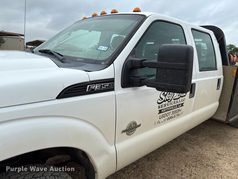 image for item ED5724 2011 Ford F350 Super Duty Crew Cab flatbed pickup truck