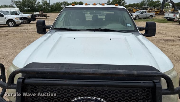 image for item ED5724 2011 Ford F350 Super Duty Crew Cab flatbed pickup truck