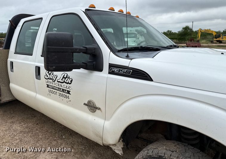 image for item ED5724 2011 Ford F350 Super Duty Crew Cab flatbed pickup truck