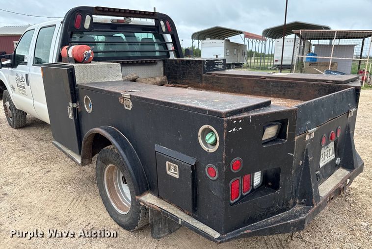 image for item ED5724 2011 Ford F350 Super Duty Crew Cab flatbed pickup truck