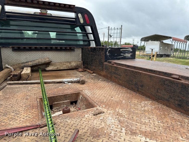 image for item ED5724 2011 Ford F350 Super Duty Crew Cab flatbed pickup truck