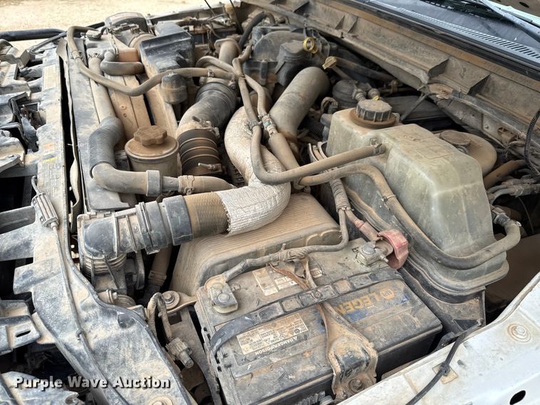 image for item ED5724 2011 Ford F350 Super Duty Crew Cab flatbed pickup truck