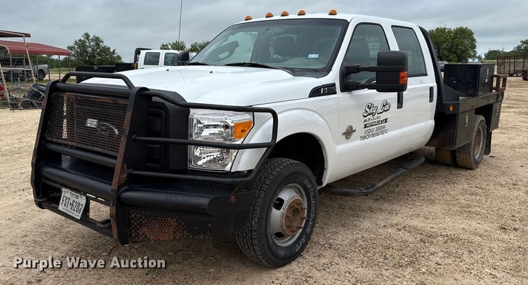 image for item ED5730 2011 Ford F350 Super Duty Crew Cab flatbed pickup truck