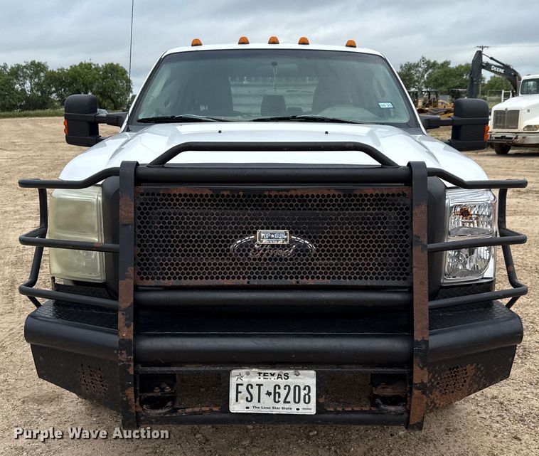 image for item ED5730 2011 Ford F350 Super Duty Crew Cab flatbed pickup truck