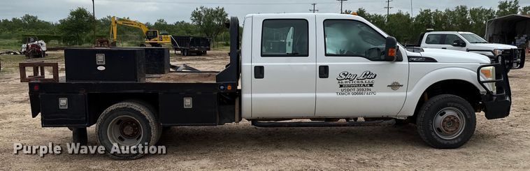 image for item ED5730 2011 Ford F350 Super Duty Crew Cab flatbed pickup truck