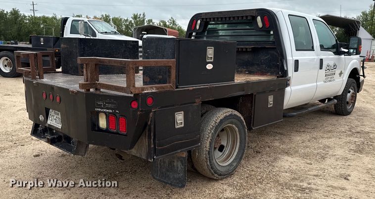 image for item ED5730 2011 Ford F350 Super Duty Crew Cab flatbed pickup truck