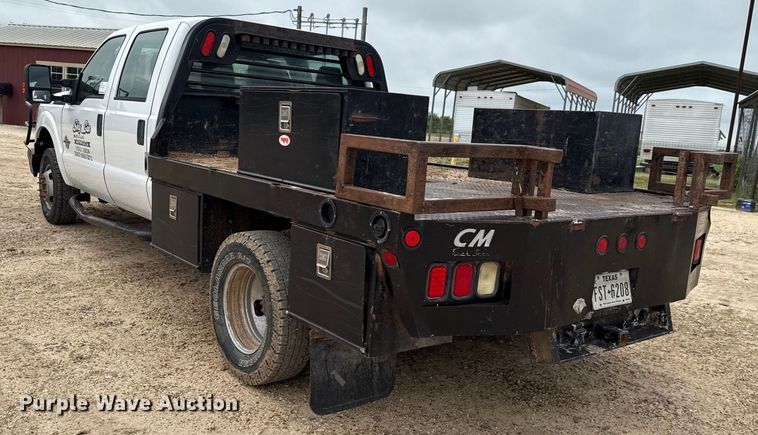 image for item ED5730 2011 Ford F350 Super Duty Crew Cab flatbed pickup truck