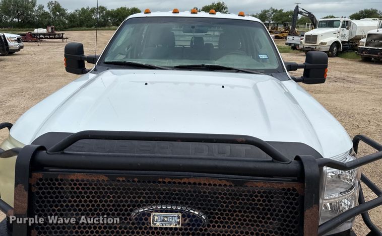 image for item ED5730 2011 Ford F350 Super Duty Crew Cab flatbed pickup truck