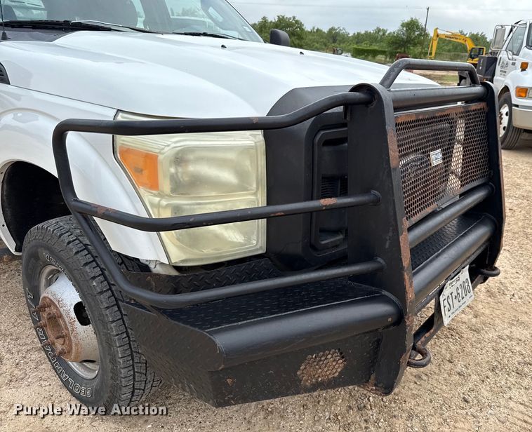 image for item ED5730 2011 Ford F350 Super Duty Crew Cab flatbed pickup truck