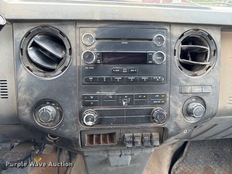 image for item ED5730 2011 Ford F350 Super Duty Crew Cab flatbed pickup truck