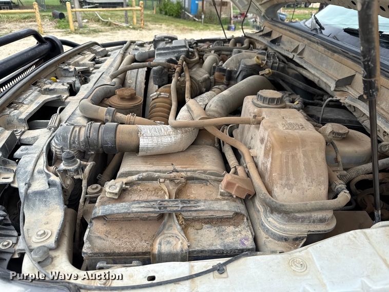 image for item ED5730 2011 Ford F350 Super Duty Crew Cab flatbed pickup truck