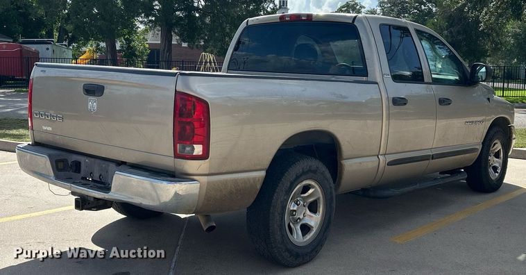 image for item EX9812 2002 Dodge Ram 1500 Quad Cab pickup truck