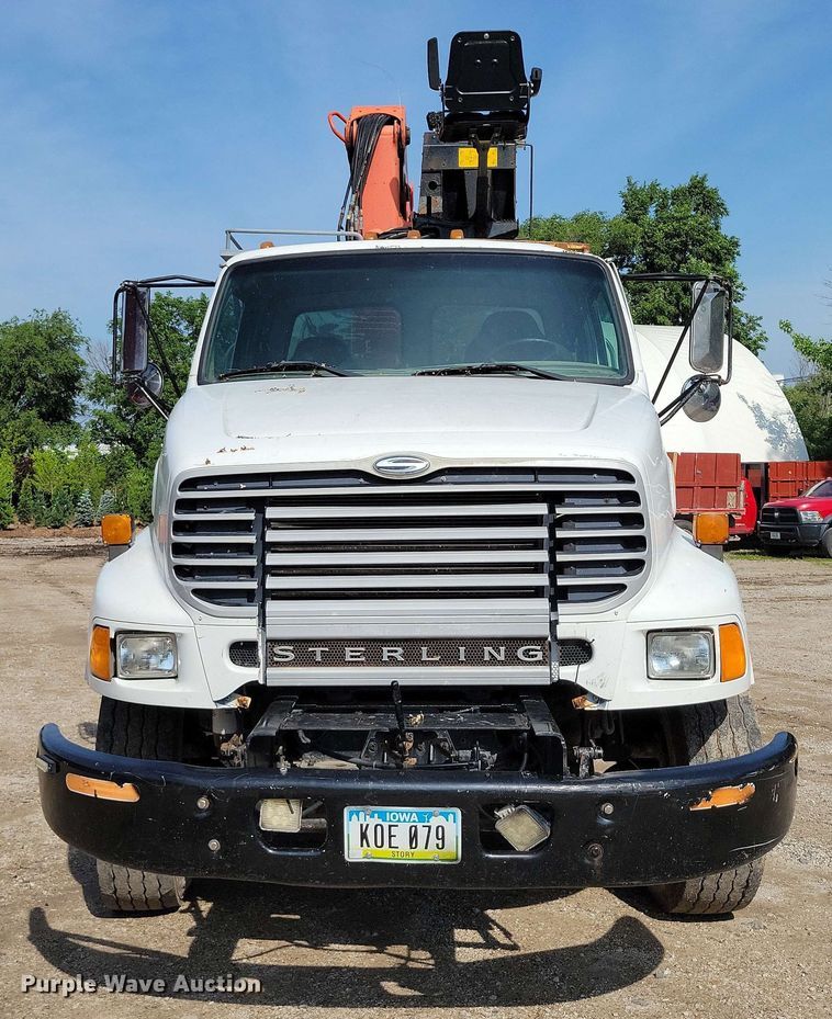 image for item DX7031 2003 Sterling LT8500 grapple crane truck