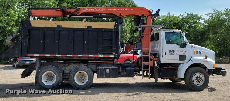 image for item DX7031 2003 Sterling LT8500 grapple crane truck