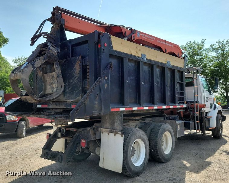 image for item DX7031 2003 Sterling LT8500 grapple crane truck