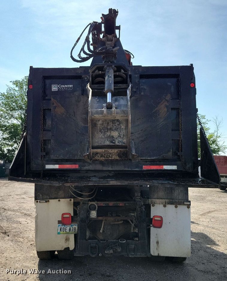 image for item DX7031 2003 Sterling LT8500 grapple crane truck