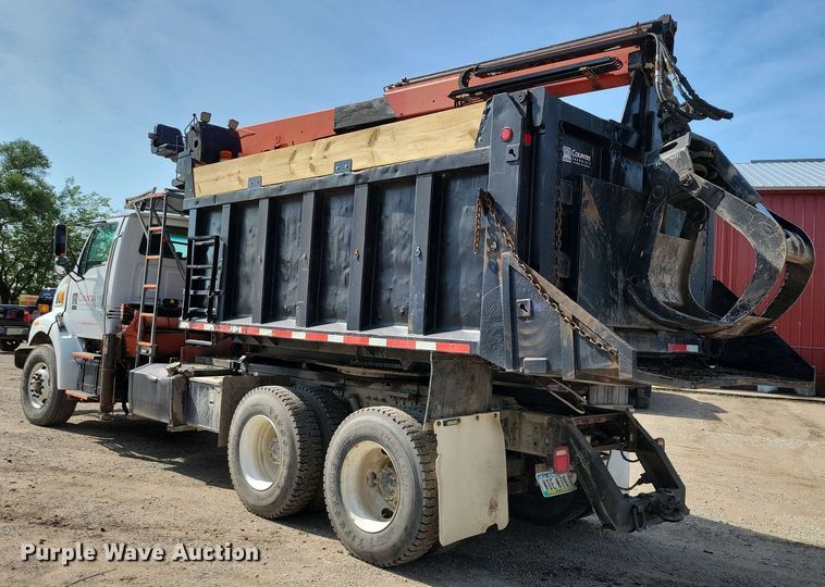 image for item DX7031 2003 Sterling LT8500 grapple crane truck
