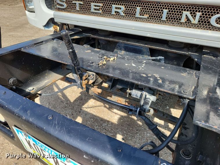 image for item DX7031 2003 Sterling LT8500 grapple crane truck