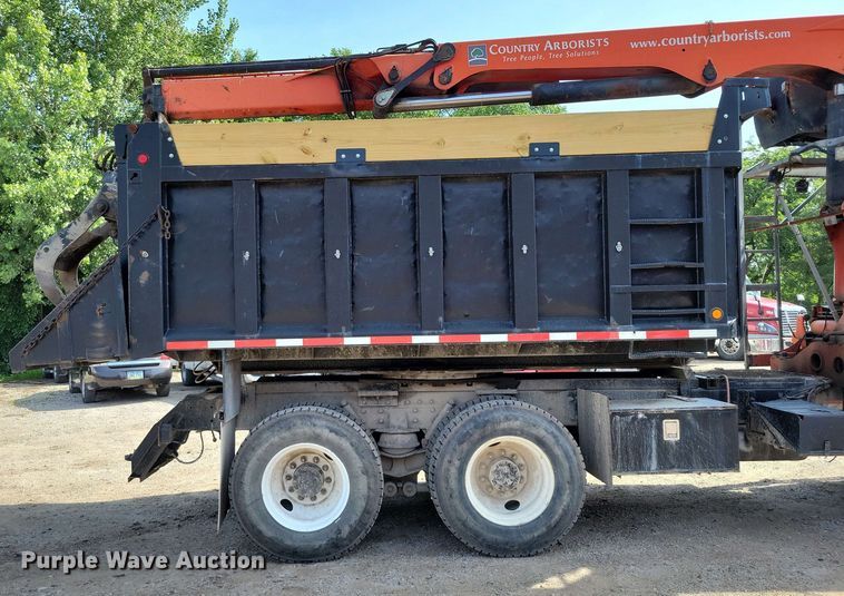 image for item DX7031 2003 Sterling LT8500 grapple crane truck