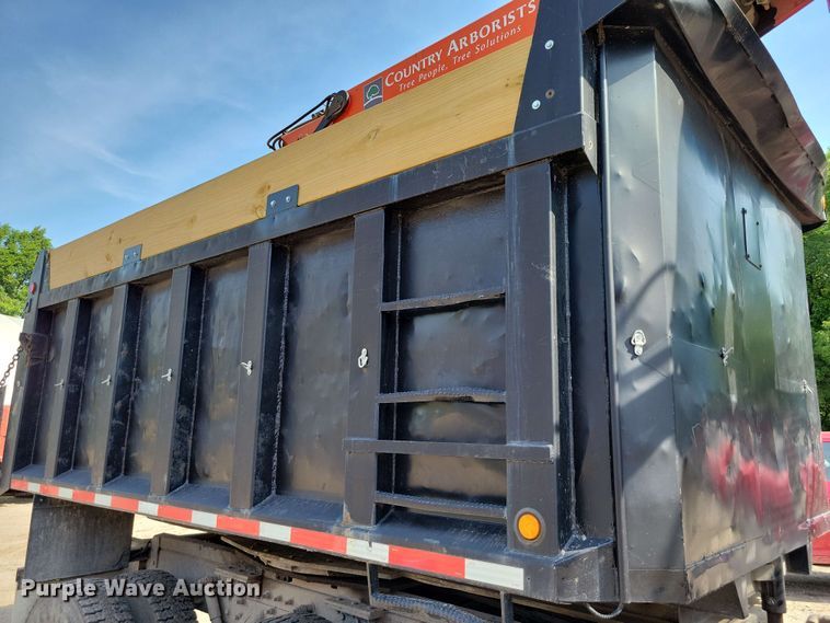 image for item DX7031 2003 Sterling LT8500 grapple crane truck