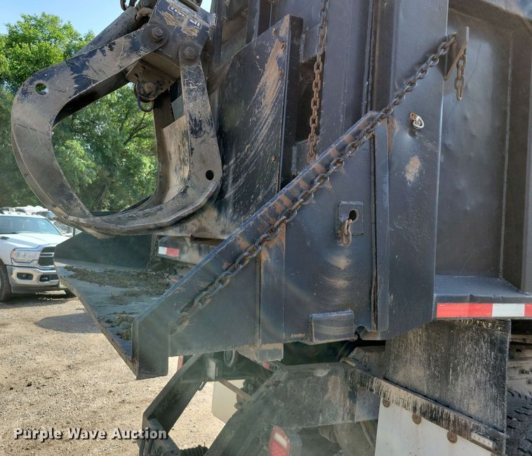 image for item DX7031 2003 Sterling LT8500 grapple crane truck