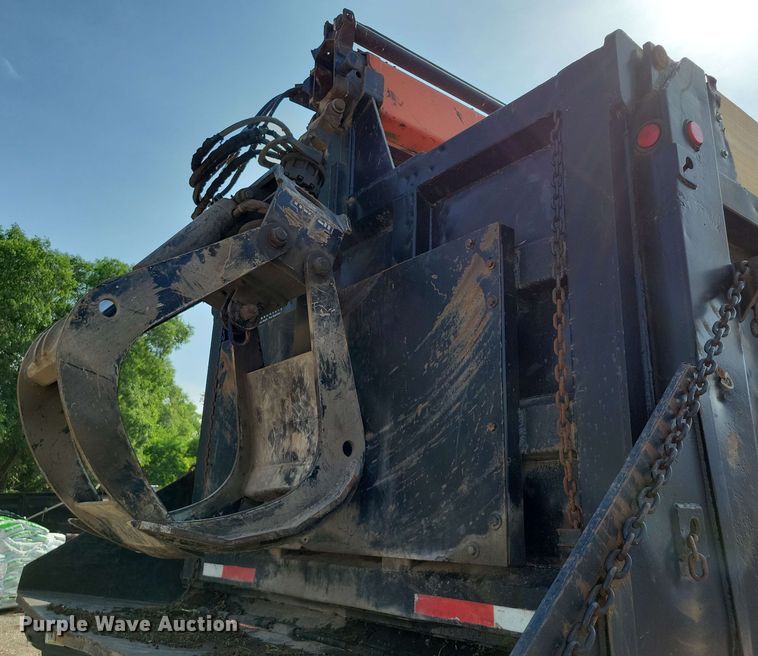 image for item DX7031 2003 Sterling LT8500 grapple crane truck