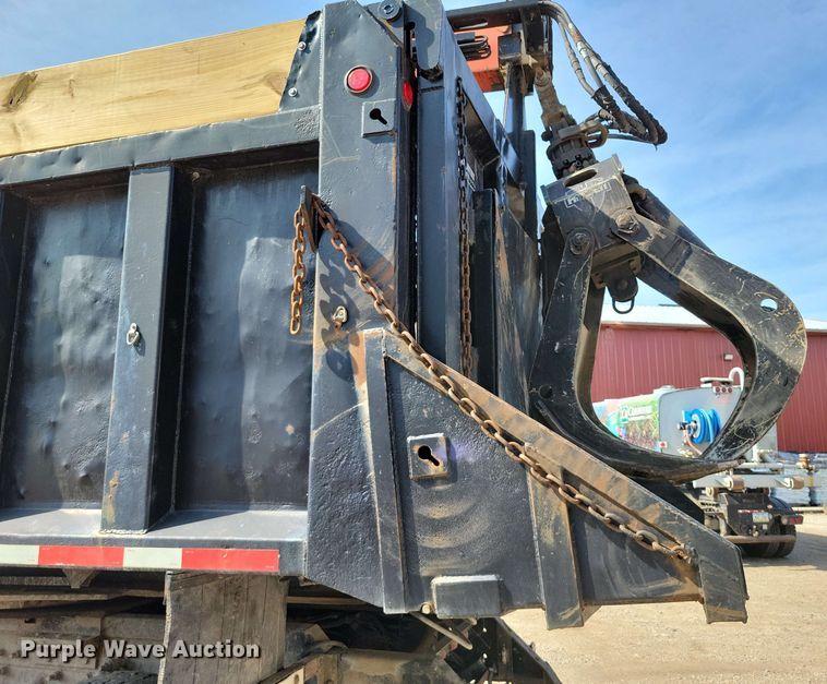 image for item DX7031 2003 Sterling LT8500 grapple crane truck