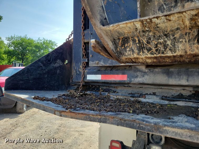 image for item DX7031 2003 Sterling LT8500 grapple crane truck