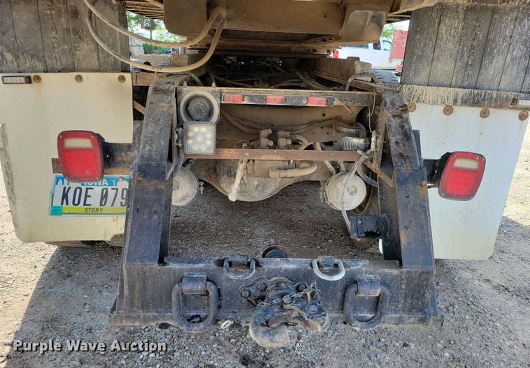 image for item DX7031 2003 Sterling LT8500 grapple crane truck