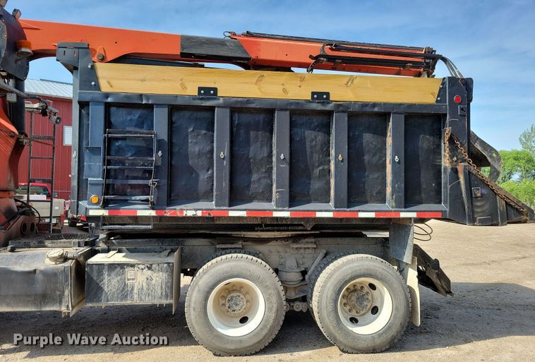 image for item DX7031 2003 Sterling LT8500 grapple crane truck