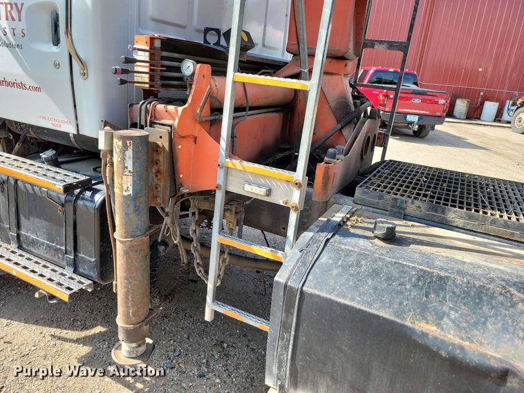 image for item DX7031 2003 Sterling LT8500 grapple crane truck