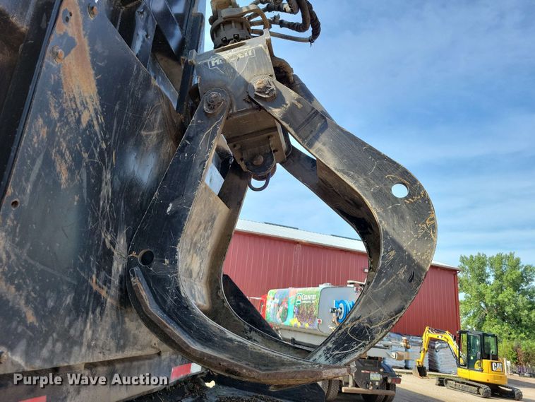 image for item DX7031 2003 Sterling LT8500 grapple crane truck