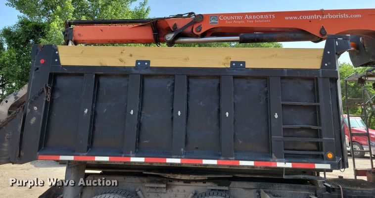 image for item DX7031 2003 Sterling LT8500 grapple crane truck