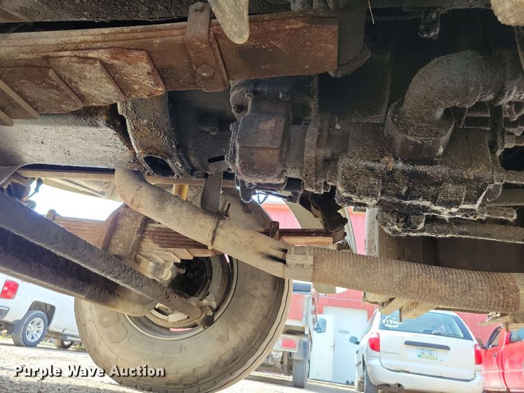 image for item DX7031 2003 Sterling LT8500 grapple crane truck