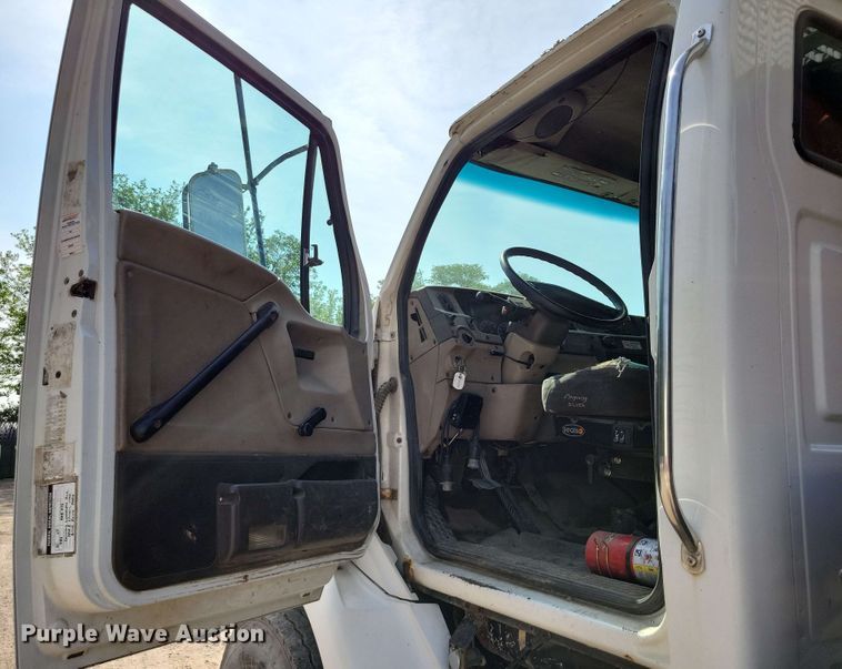 image for item DX7031 2003 Sterling LT8500 grapple crane truck