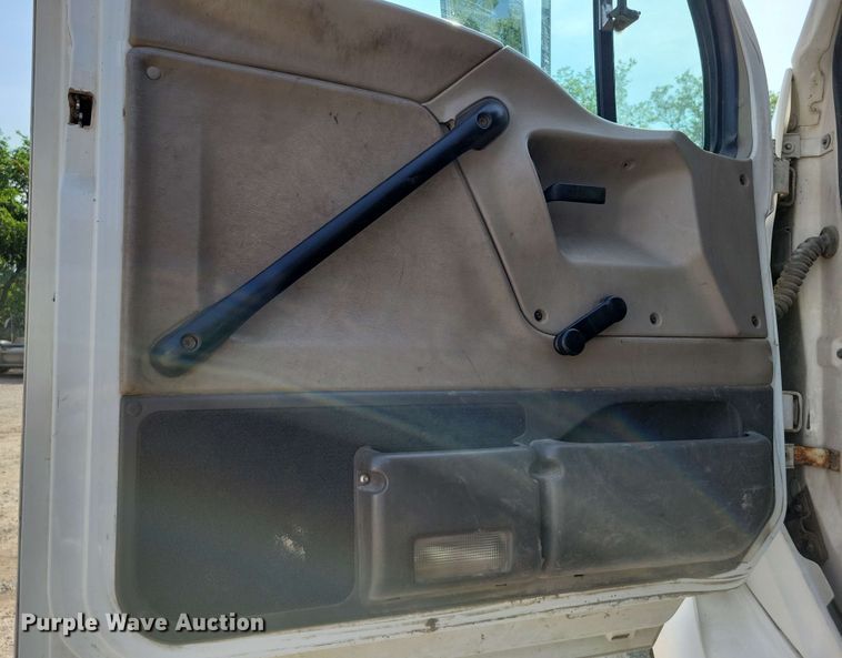 image for item DX7031 2003 Sterling LT8500 grapple crane truck