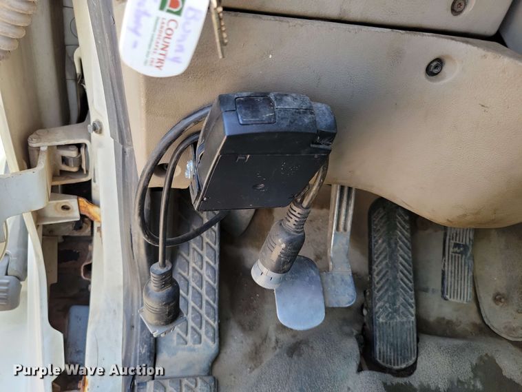 image for item DX7031 2003 Sterling LT8500 grapple crane truck