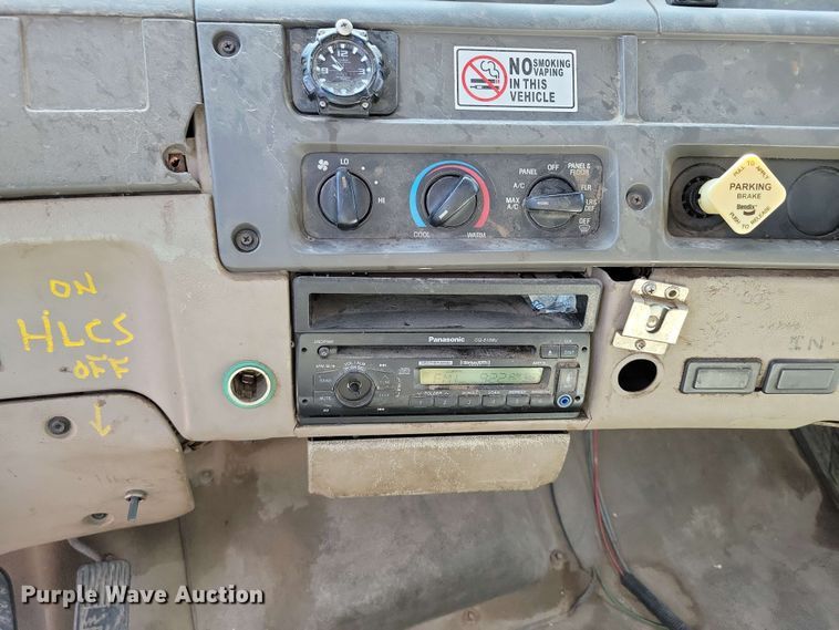 image for item DX7031 2003 Sterling LT8500 grapple crane truck