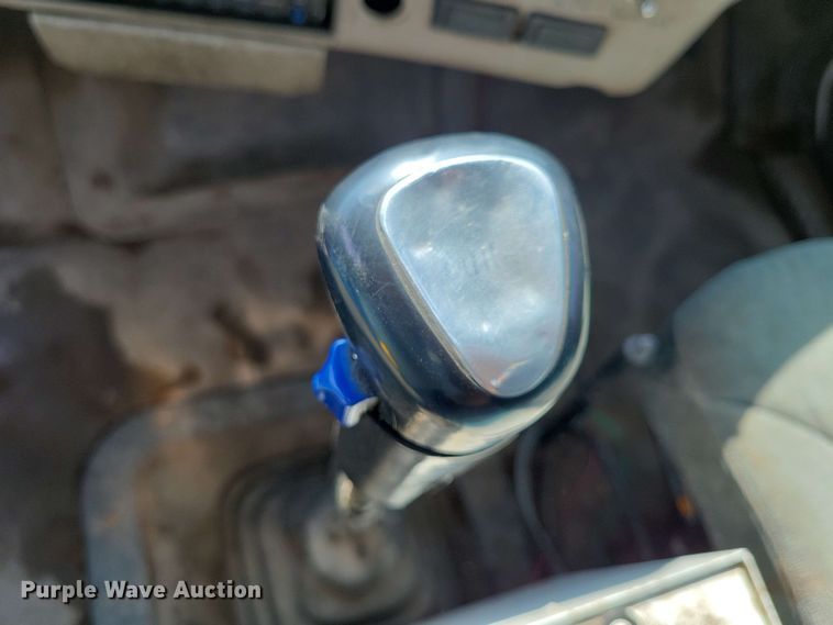 image for item DX7031 2003 Sterling LT8500 grapple crane truck