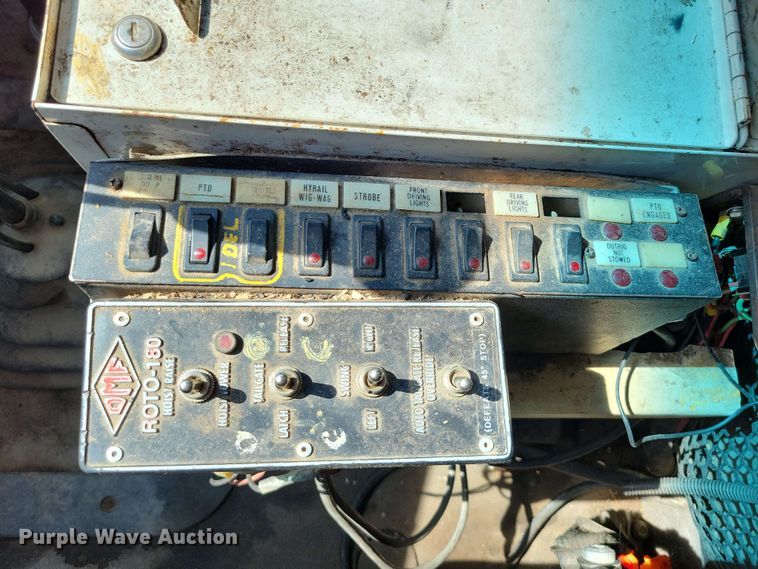 image for item DX7031 2003 Sterling LT8500 grapple crane truck