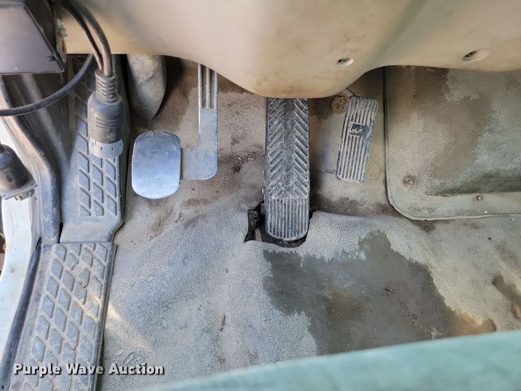 image for item DX7031 2003 Sterling LT8500 grapple crane truck