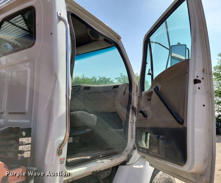 image for item DX7031 2003 Sterling LT8500 grapple crane truck