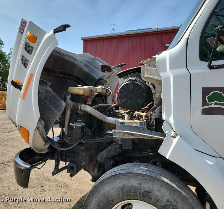 image for item DX7031 2003 Sterling LT8500 grapple crane truck