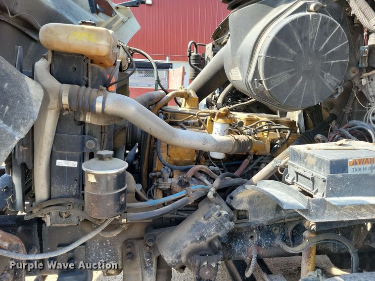 image for item DX7031 2003 Sterling LT8500 grapple crane truck